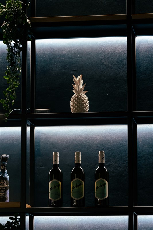 A golden pineapple on the shelf