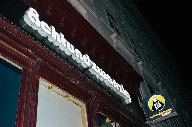The achtundzwanzig sign on the facade at night