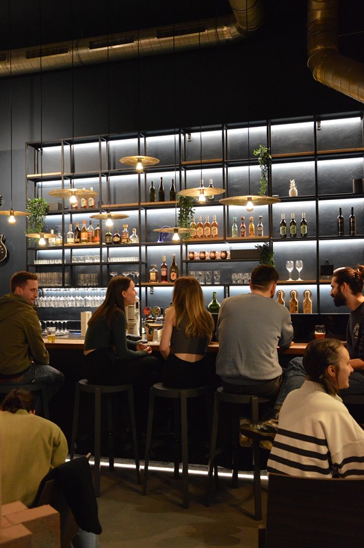 An evening crowd at the bar counter