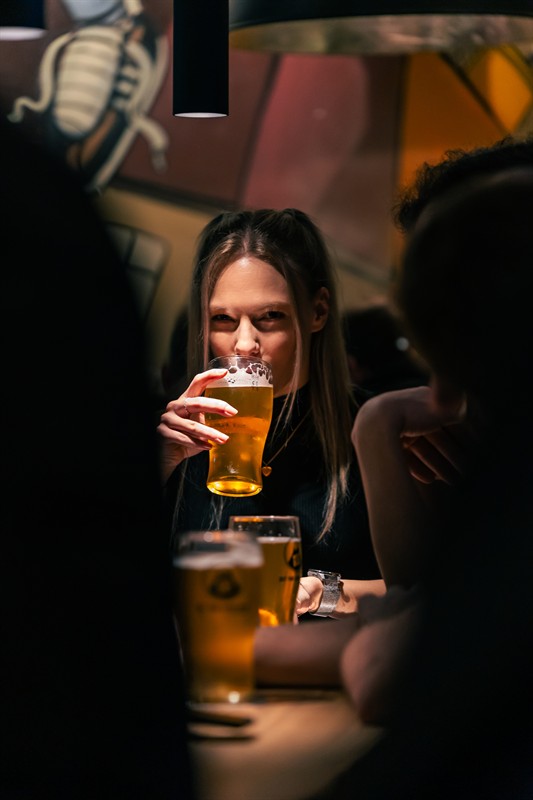 A guest enjoying a craft beer